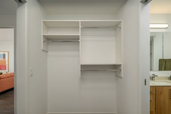 Expansive walk-in and millwork closets with built-in shelving